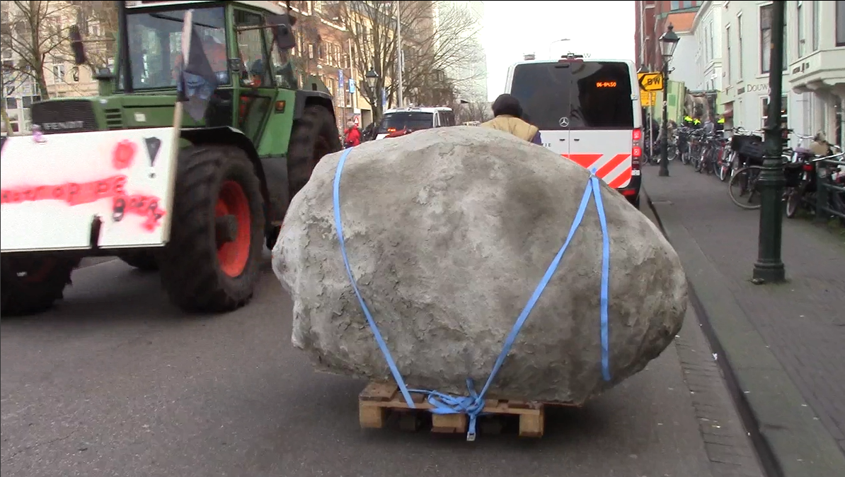 screenshot of video documentation of the tranportation of the rock